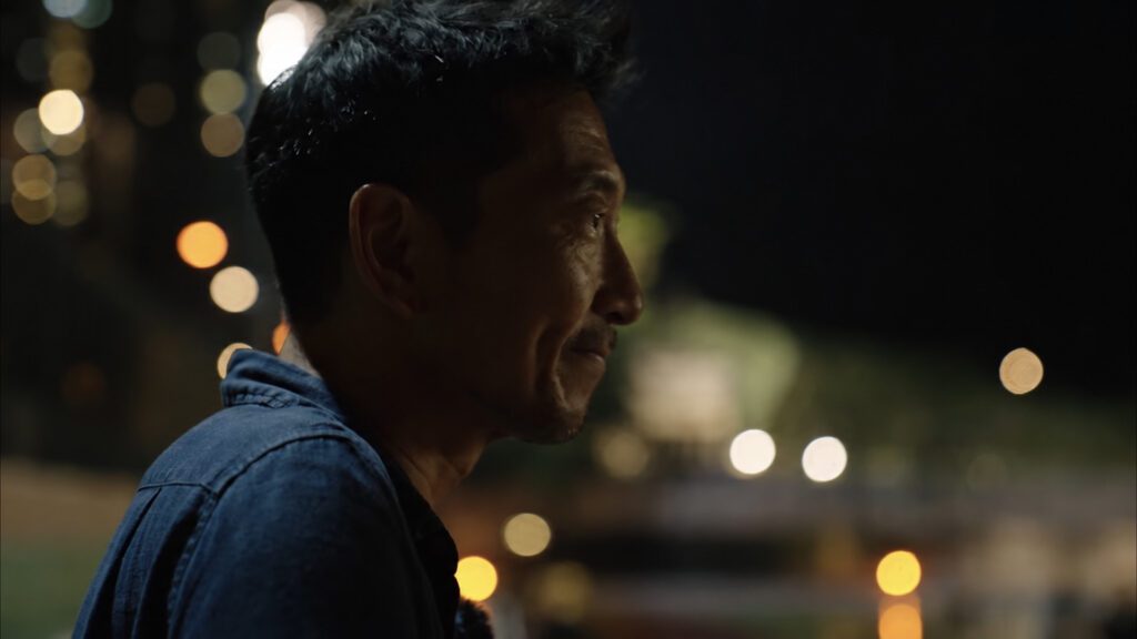 主要受訪者之一，香港全城街馬創辦人梁百行。（圖片來源：預告片截圖）